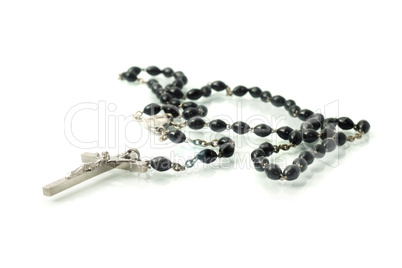 Black rosary isolated over white