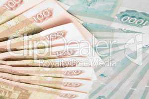 Closeup of 100 and 1000 roubles banknotes