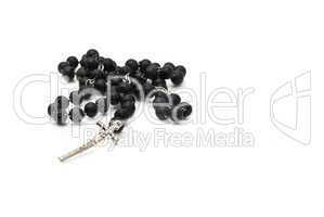 Black beads isolated over white