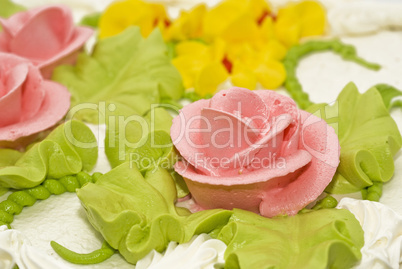 Dessert - Close-up of tasty cake with cream, pink roses
