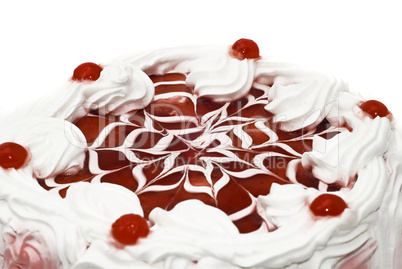 Sweet dessert - iced cake with cherries