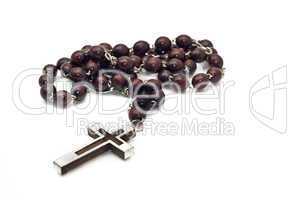 Wooden beads with metallic cross
