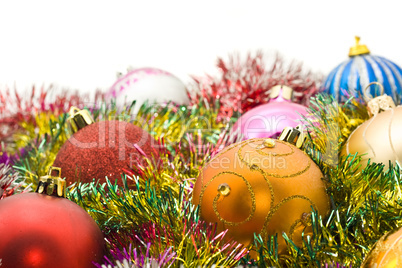 Xmas greetings - colorful decoration balls and tinsel