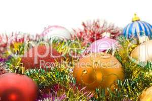 Xmas greetings - colorful decoration balls and tinsel