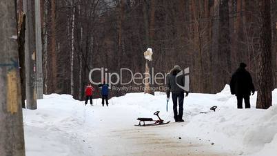 people walk in winter park