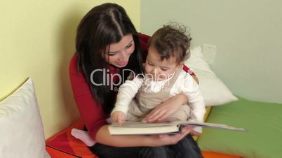 Sequence of Female Teacher Reading Book To Little Girls
