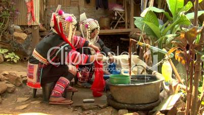 Akha Women Doing Laundry.