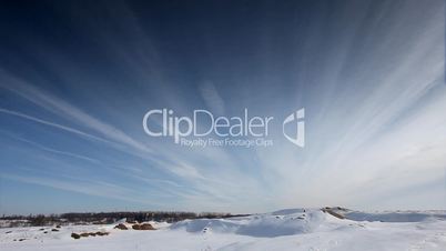 Cloudscape time lapse on winter desert
