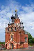Red Church with black cupolas