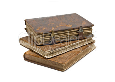 Three Old frayed books isolated over white