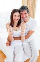 Enthusiastic couple finding out results of a pregnancy test