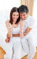 Happy couple finding out results of a pregnancy test