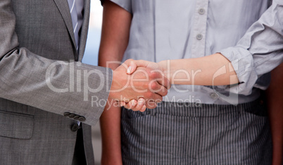 Close-up of a lucky businessteam closing a deal