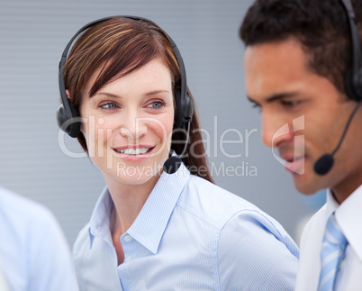 Close-up of a female customer service agent and hercolleague