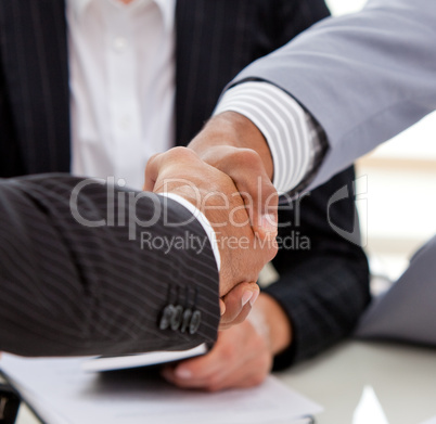 Close-up of businessmen closing a deal