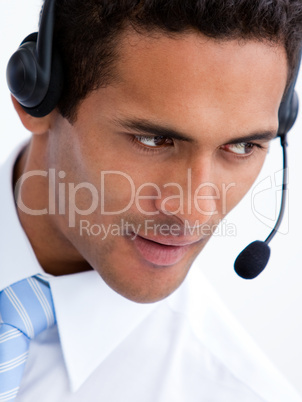 Portrait of a positive businessman with headset on