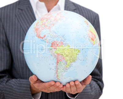 Close-up of a male executive holding a terrestrial globe Close-up of a male executive holding a terrestrial globe
