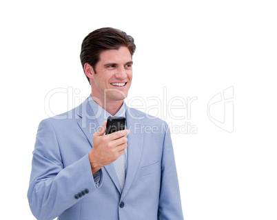 Portrait of a young businessman looking at his phone