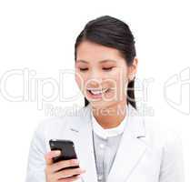 Portrait of a cheerful businesswoman looking at his phone