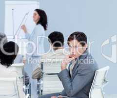 Bored charming businessman at a presentation