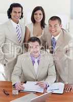 Assertive business people studying a document