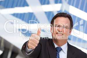 Handsome, Confident Businessman with Thumbs Up