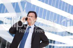 Concerned Businessman Talks on His Cell Phone