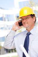 Contractor in Hardhat and Necktie Talks on His Cell Phone