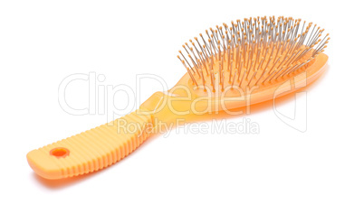 Orange hairbrush