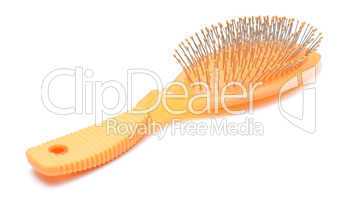 Orange hairbrush