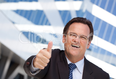 Handsome, Confident Businessman with Thumbs Up