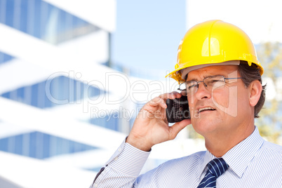 Contractor in Hardhat and Necktie Talks on His Cell Phone