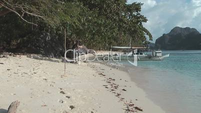 Tropical beach and boat near El Nido