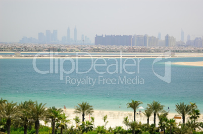 Beach of Atlantis the Palm hotel with a view on fronds of Palm J