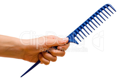 Hand holding the handle rake