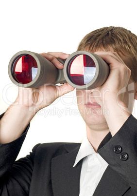 Businessman with binoculars searching Businessman with binoculars searching