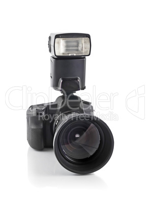 Professional DSLR camera with telephoto lens and flash
