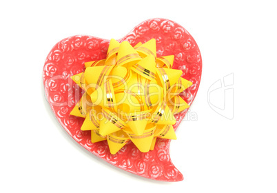 Love - yellow bow on red heart