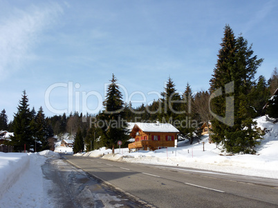 Mountain chalet by winter