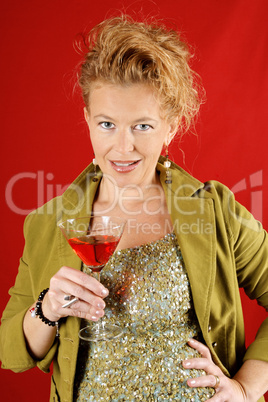 Beautiful blond woman with red drink