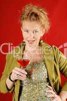 Beautiful blond woman with red drink