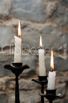 Three candles in candlestick