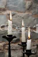 Three candles in candlestick
