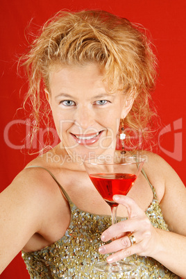 Blond woman with red drink