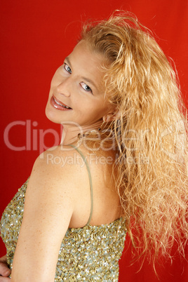 Blond woman with green sequins top
