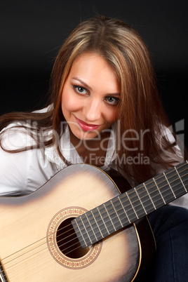 Woman with guitar.