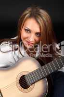 Woman with guitar.