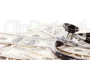 Stethoscope Laying on Stacks of Money