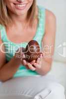 Attractive woman holding an easter egg