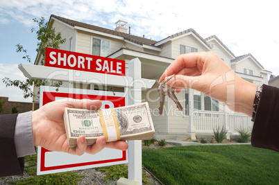 Handing Over Cash For House Keys and Short Sale Sign